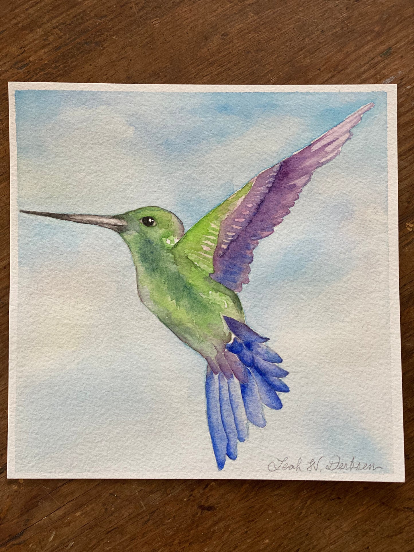 the original, signed painting of a hummingbird in flight.