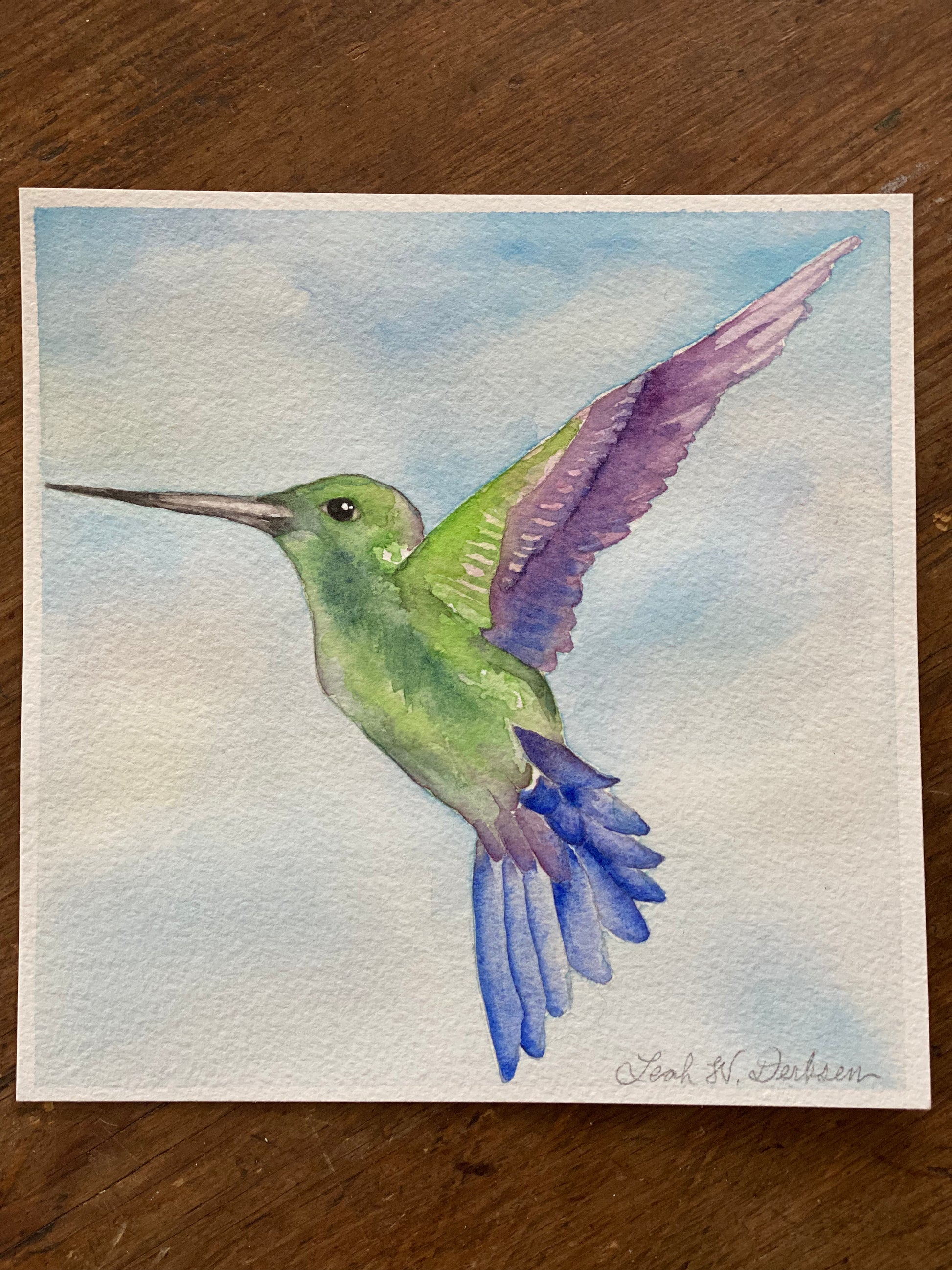 the original, signed painting of a hummingbird in flight.