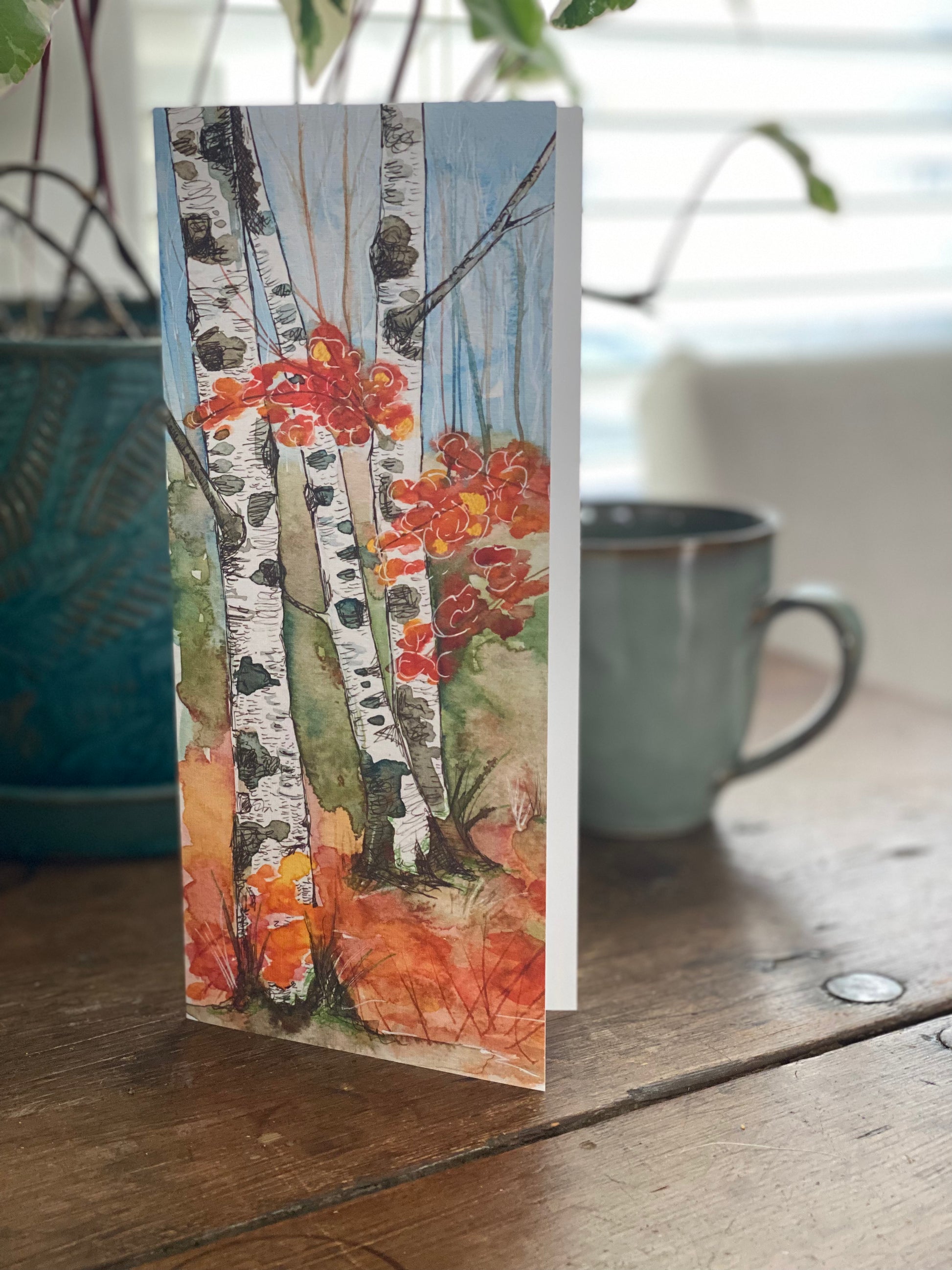 4x greeting card with a watercolor painting of birch trees and fall foliage.