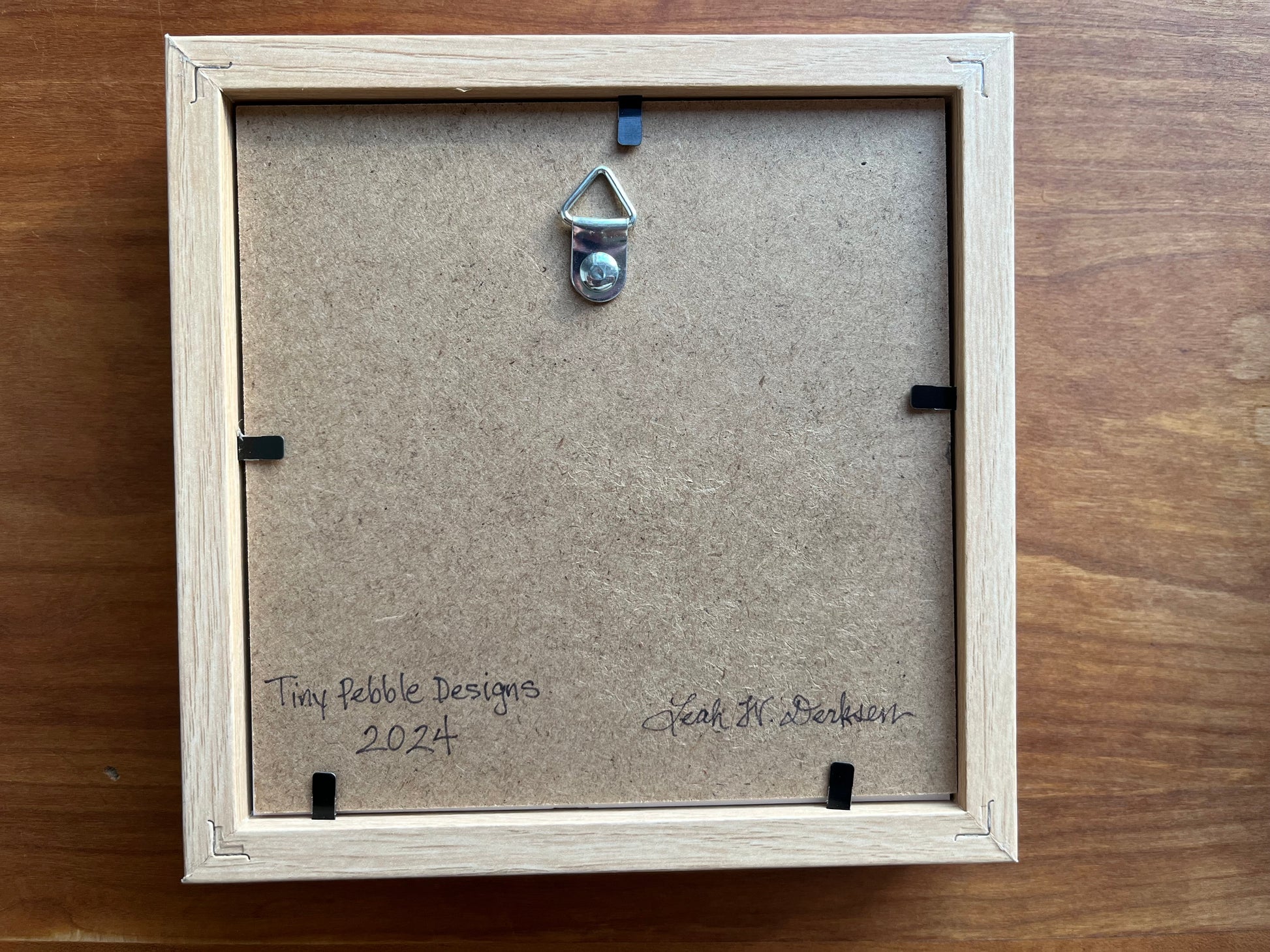 The back of a shadowbox frame.