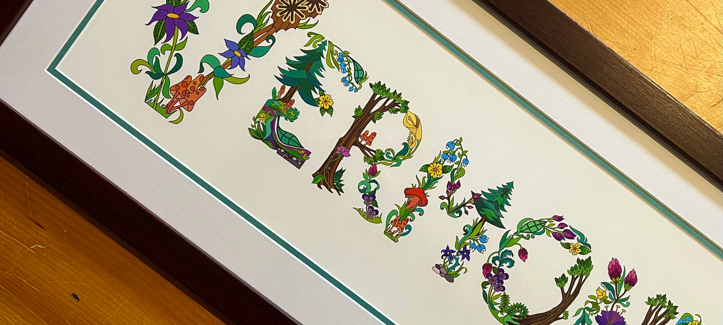 Close-up of an art print of botanical lettering spelling the word, Vermont.