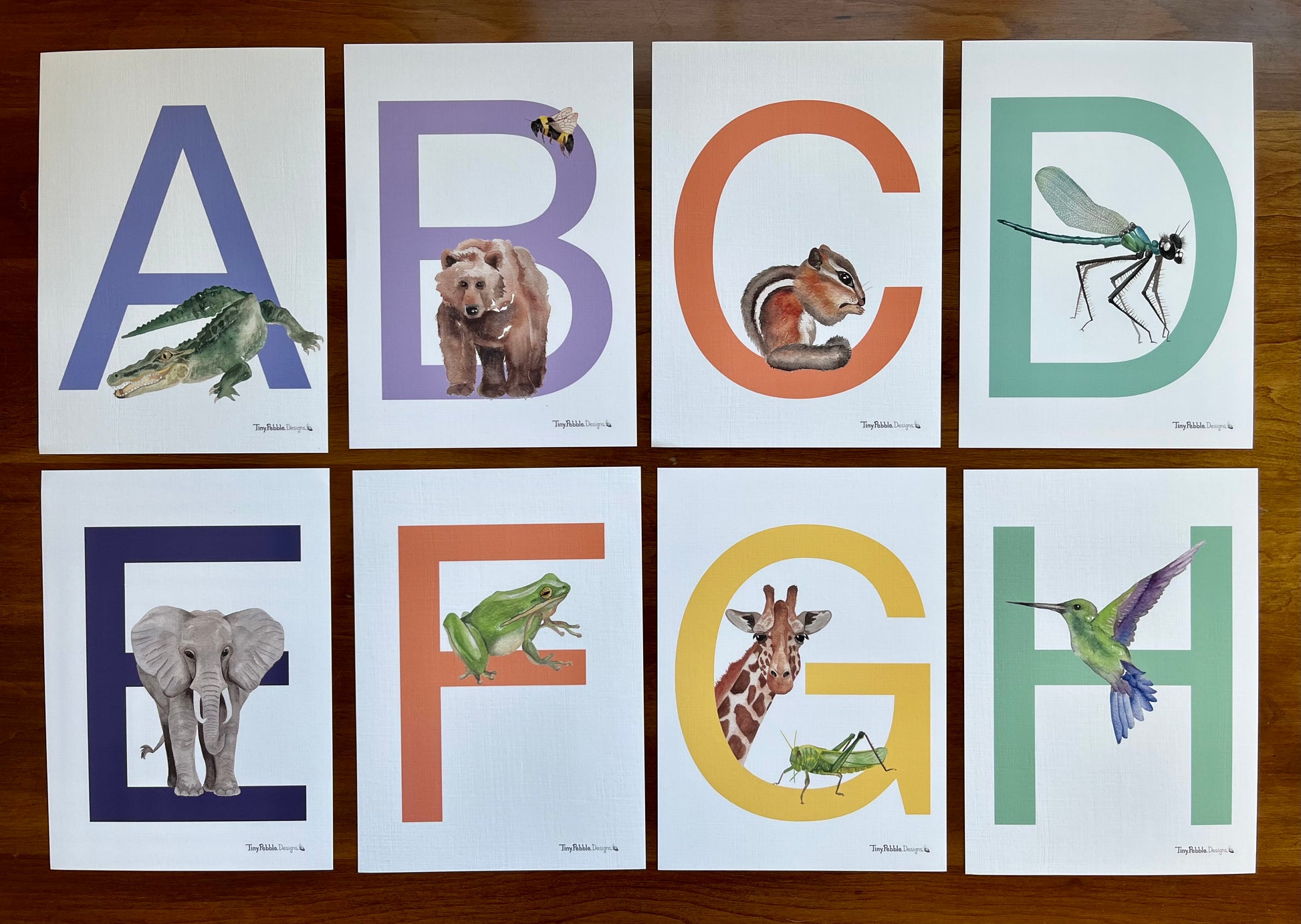 alphabet letters A through H with watercolor animals for each letter.
