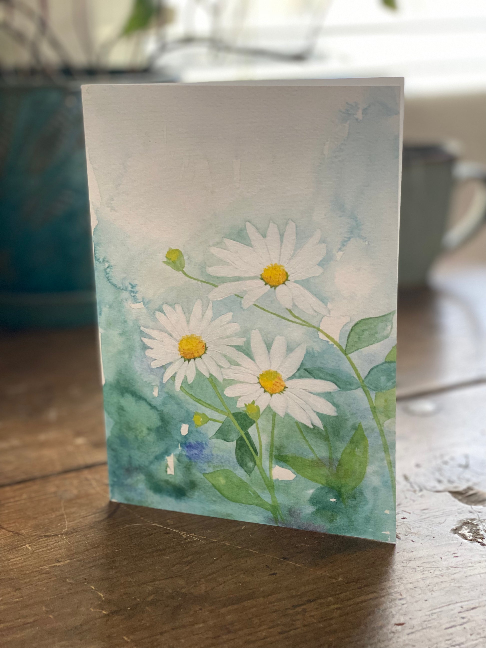 5x7 greeting card with watercolor daisies.