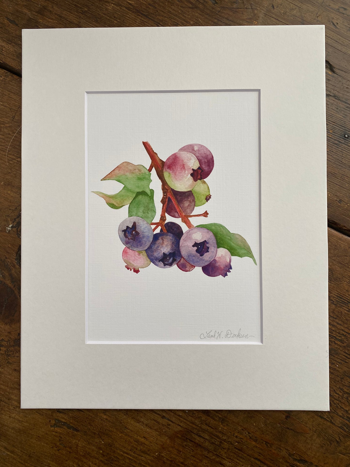 matted 5x7 print of watercolor blueberries.