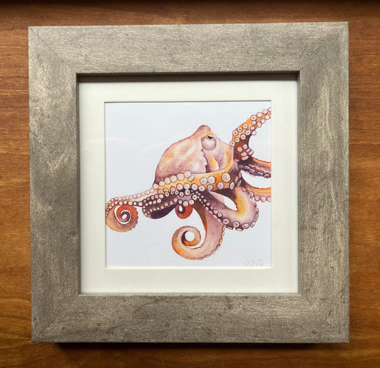 Colorful watercolor octopus in a grey picture frame with a white matte