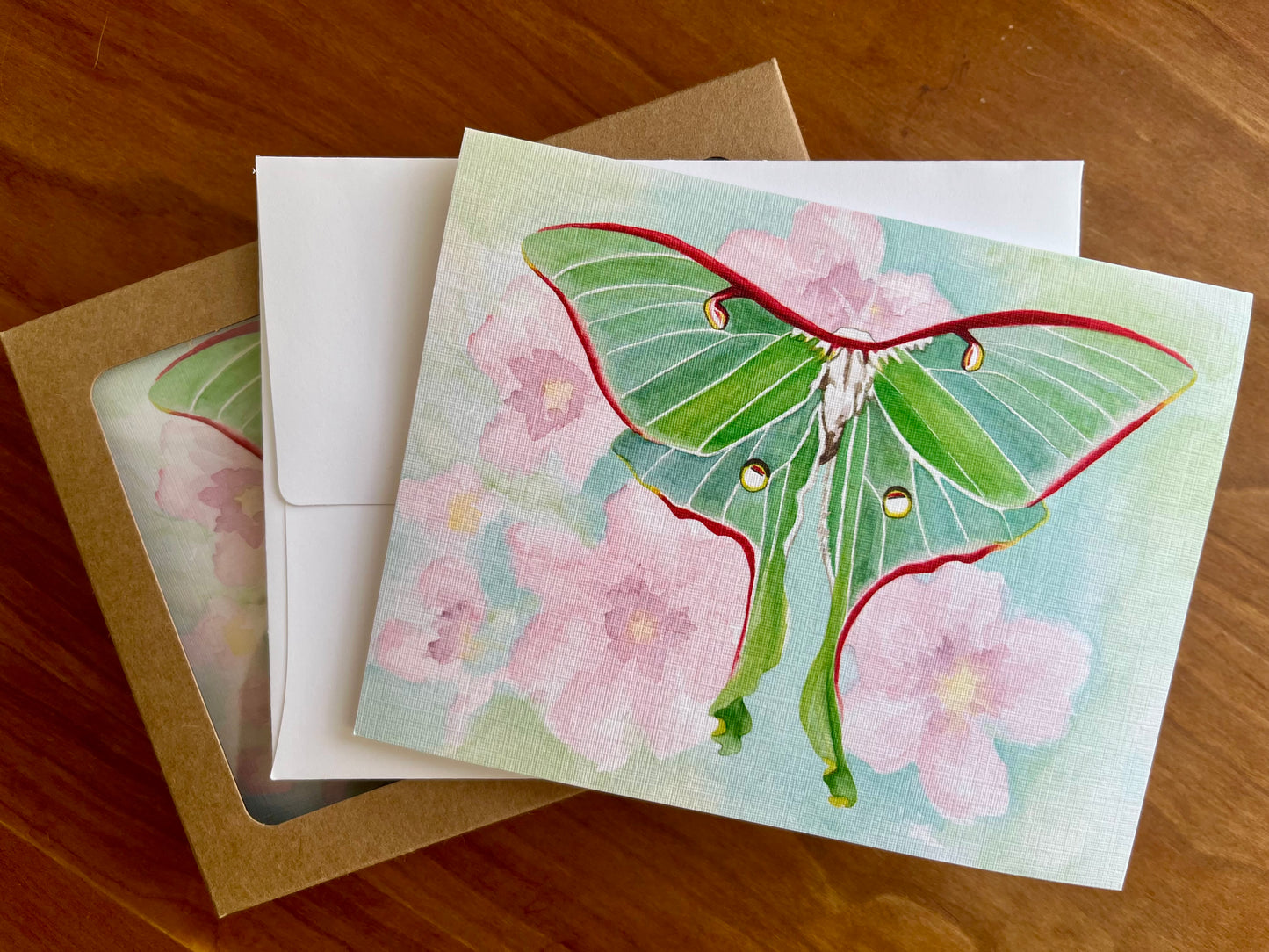 Collection of greeting cards with a watercolor painting of a luna moth. 