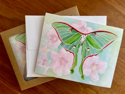 Collection of greeting cards with a watercolor painting of a luna moth. 