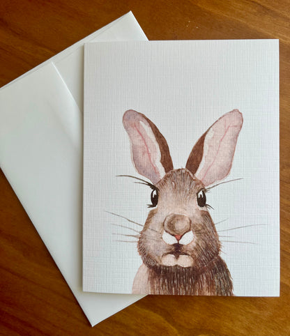 Greeting card with a watercolor painting of a rabbit.