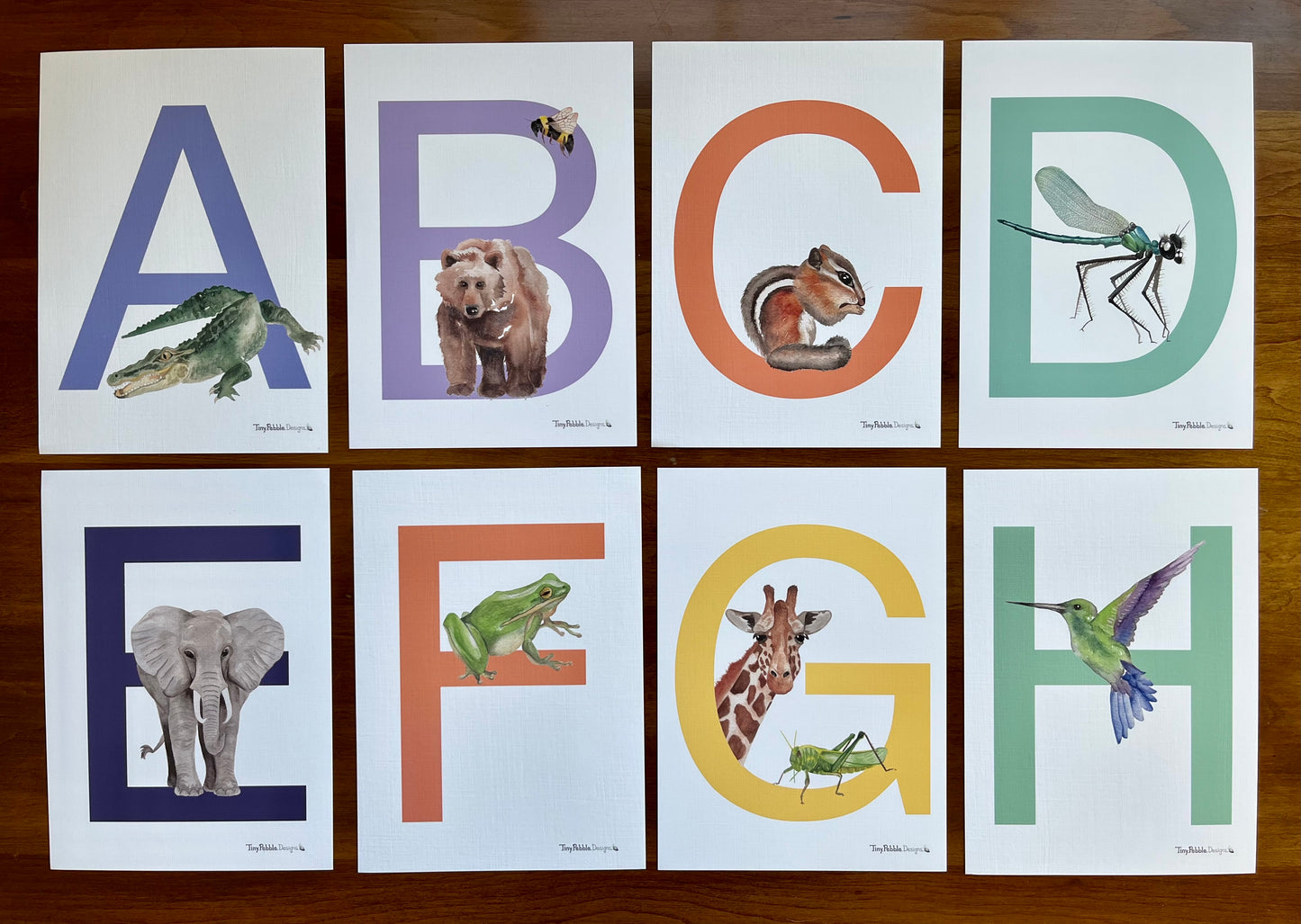 alphabet letters A through H with watercolor animals for each letter. 