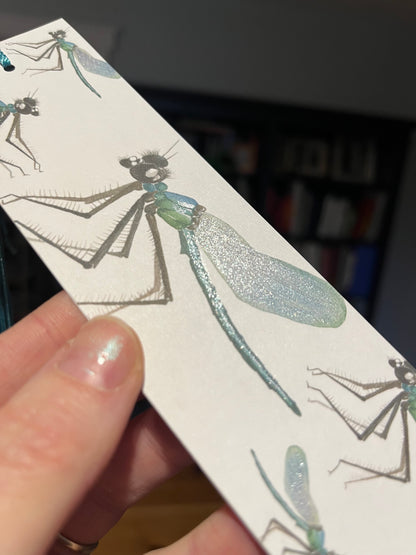 closeup of bookmark with watercolored dragonflies.