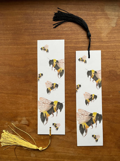 two bookmarks with watercolor bumblebees on them.