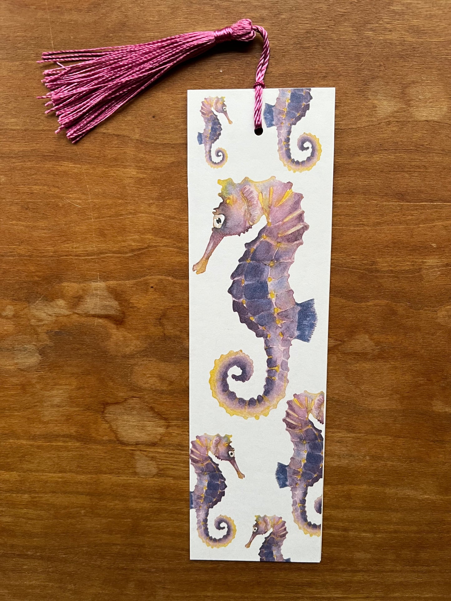 bookmark with watercolor seahorses on it. 