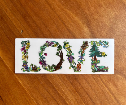 sticker with botanical letters spelling the word love.